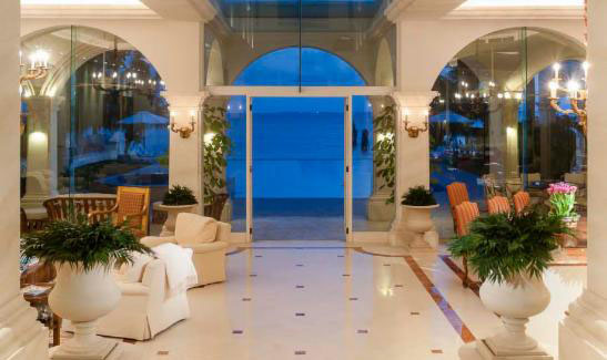 Villa Architecture, Interior Design and Turn-key by Jerry Jacobs Design © Atrium at night. View the pool and Ocean from the door.