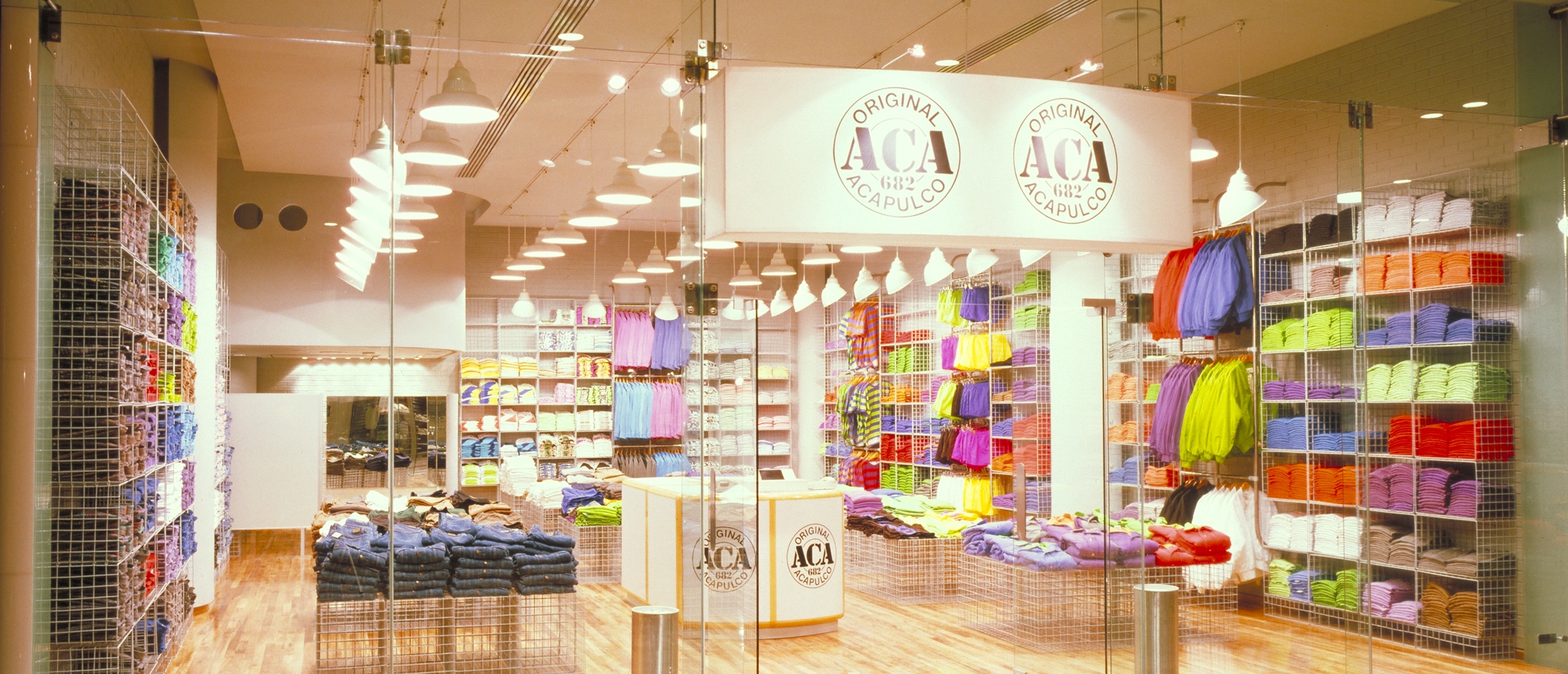 Oculus an Eye. Architecture. Interior Design. Two round portholes used as a signature at the Aca Joe stores designed By Jerry Jacobs Design