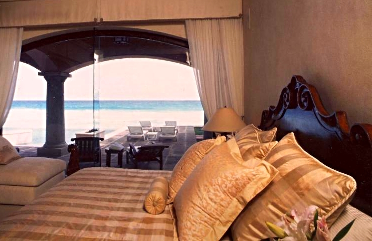 Designed for Reba McEntire in Cancun, this Hacienda style Villa. Master Bedroom with Ocean views. Architecture and Interior Design by Jarry Jacobs Design ©