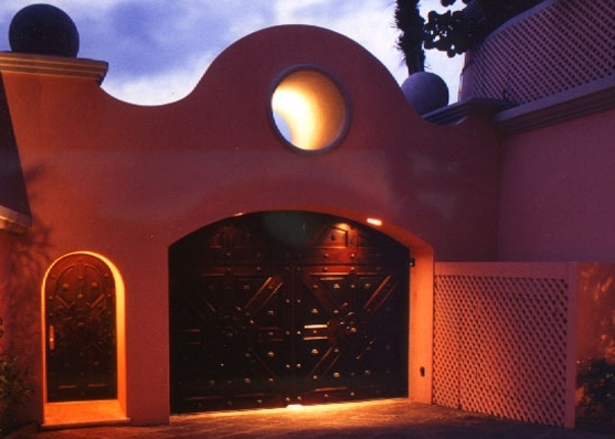 Designed for Reba McEntire in Cancun, this Hacienda style Villa Interior of street entrance. Architecture and Interior Design by Jarry Jacobs Design ©
