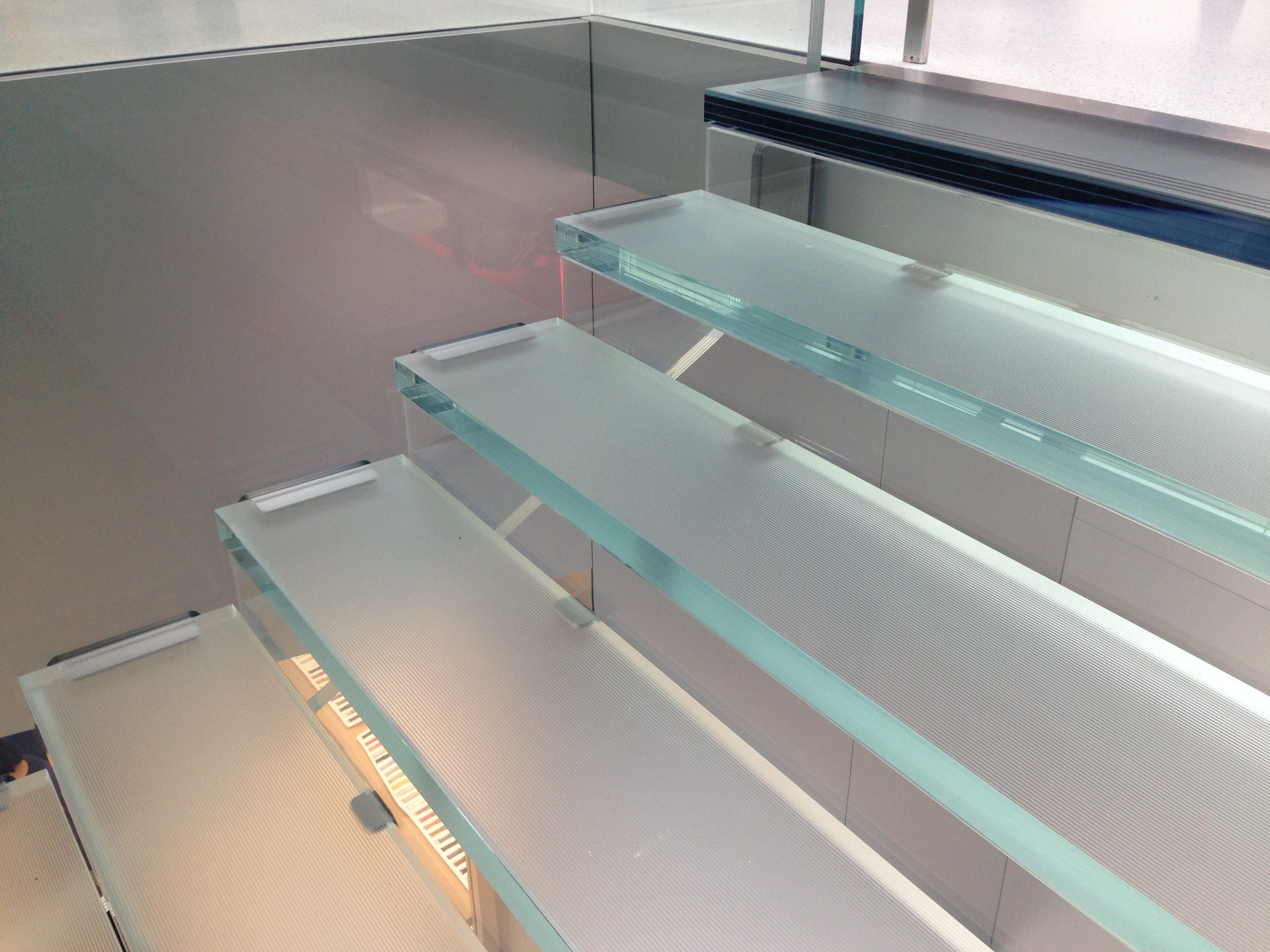 Interior Glass Floor Design in San Francisco by Jerry JACOBS DESIGN ©. Staiways at Apple Store in Union Square San Francisco by Lord Norman Foster.