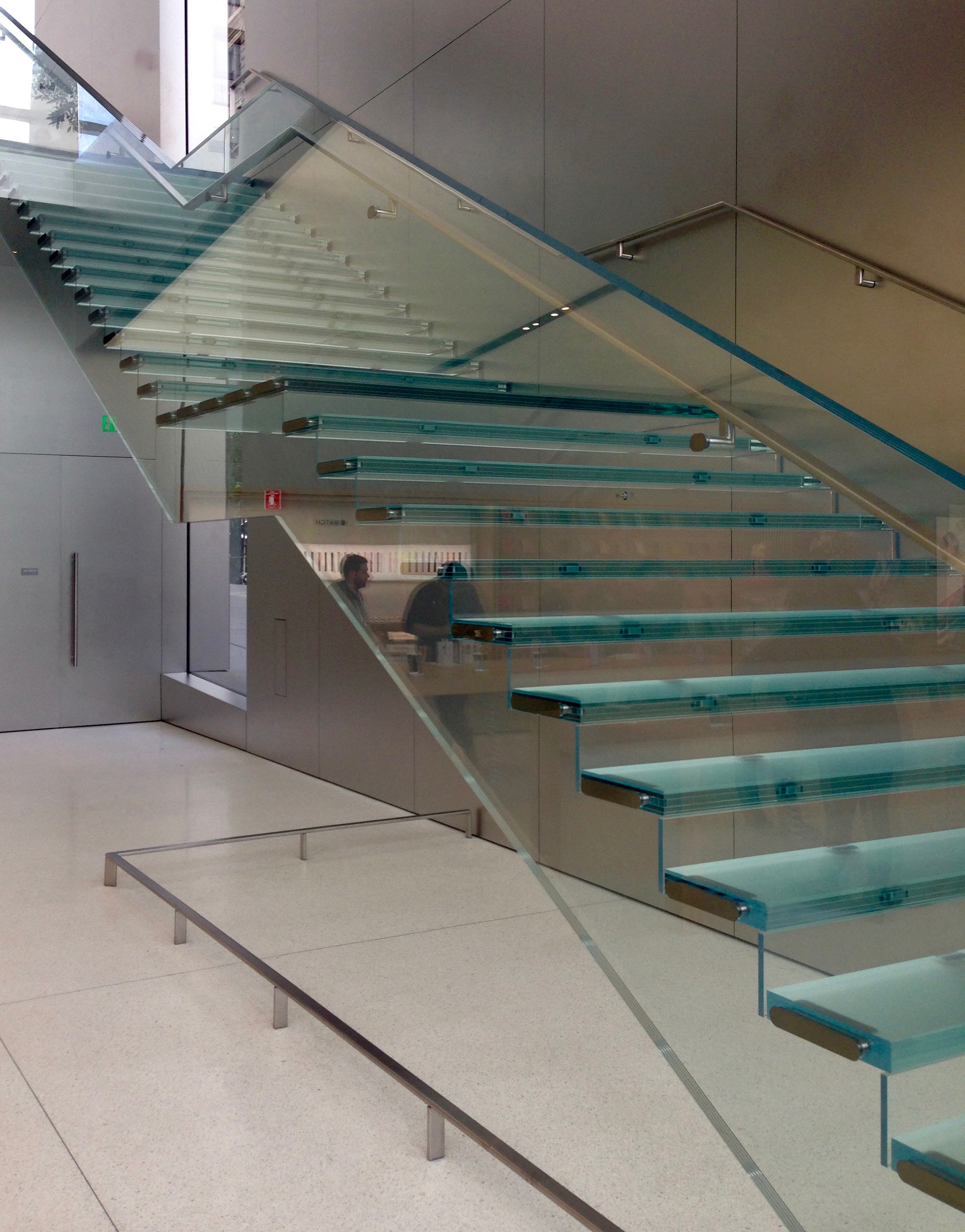 Interior Glass Floor Design in San Francisco by Jerry JACOBS DESIGN ©. Staiways at Apple Store in Union Square San Francisco by Lord Norman Foster.
