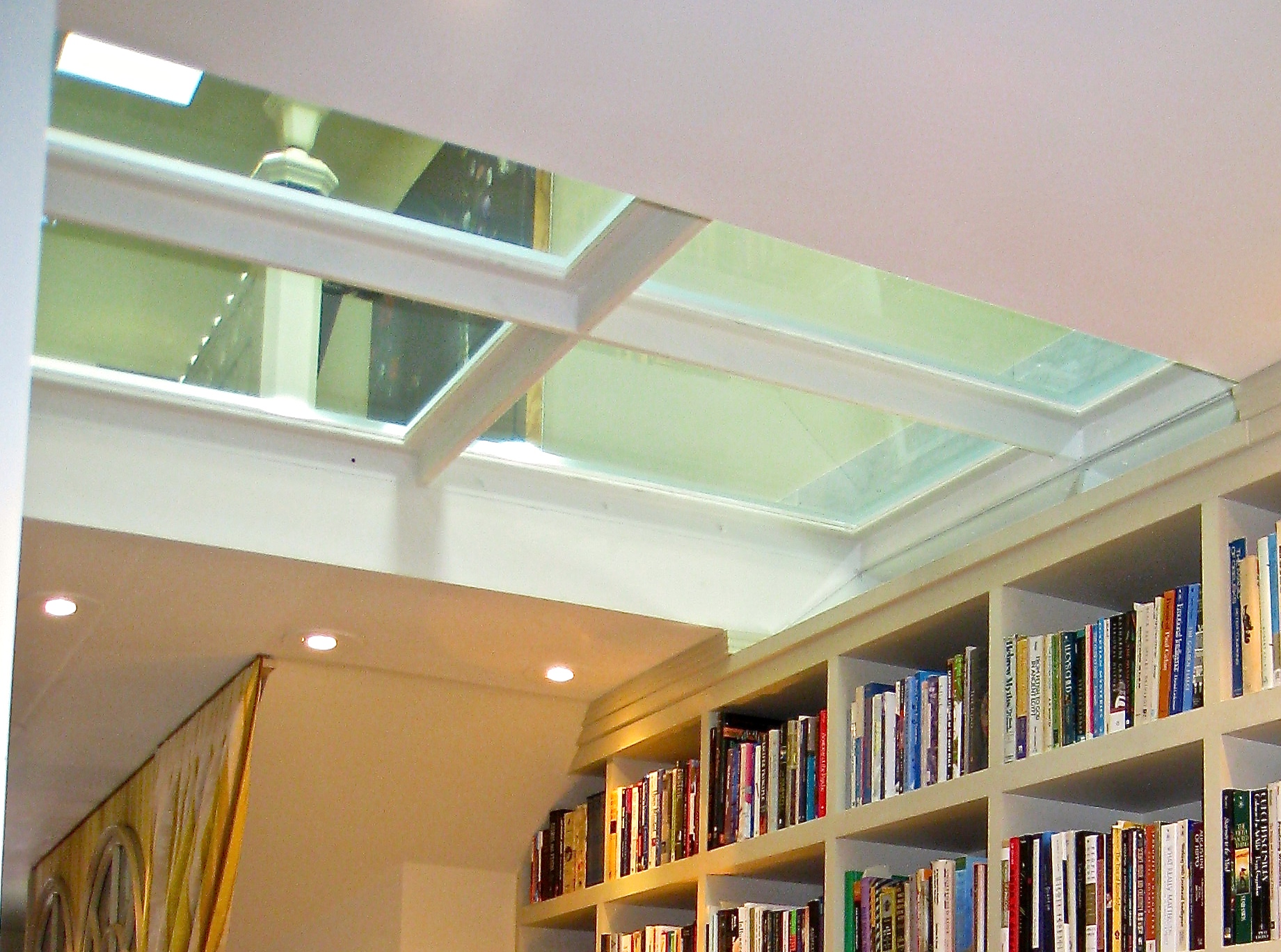 Interior Glass Floor Design in San Francisco by Jerry JACOBS DESIGN ©. Staiways landing at Buena Vista Park Deco.