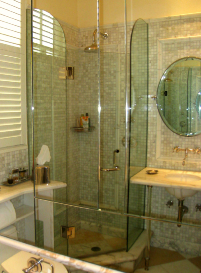 Penthouse apartment Interior Design Pacific Height San Francisco by Jerry Jacobs Design©. Guest full bathroom, mosaic walls, mirrored corner shower to code. Scheval elliptical mirror.