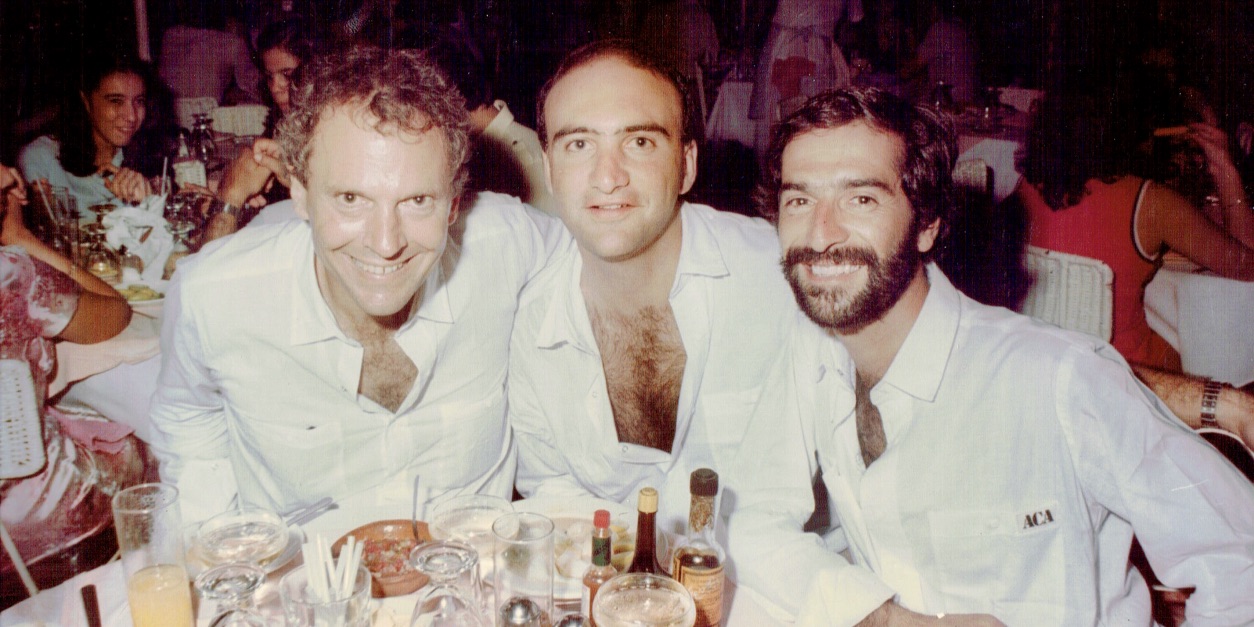 Joseph S. Rank, Gerald (Jerry) Jacobs, Joaquin Clausell celebrating after new store opening