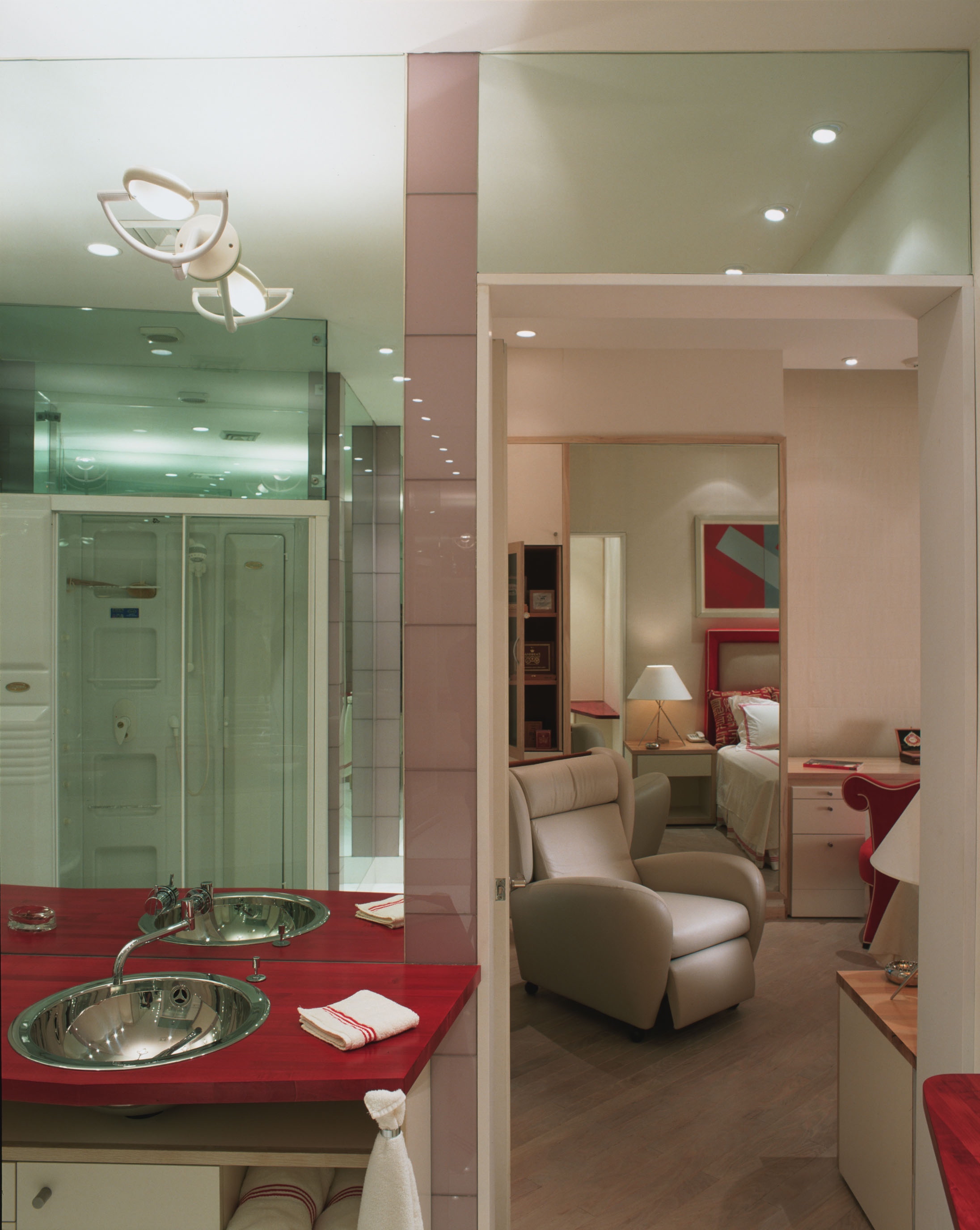 Contemporary Bathroom Designs by Jerry Jacobs Design ©.Red Butter block vanity open to bedroom Monterrey, Nuevo Leon, MX. apartment.