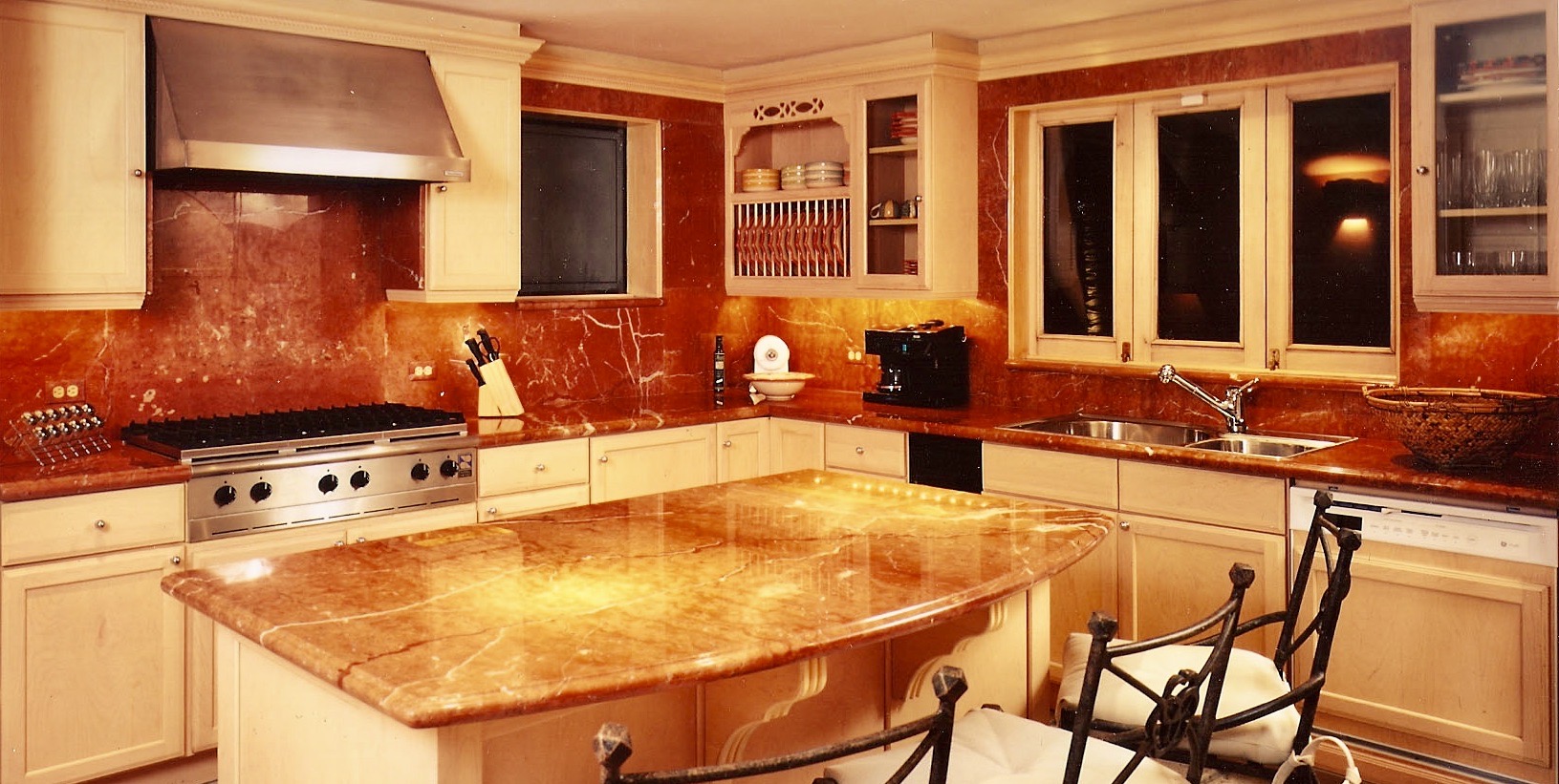 Hacienda on the Beach kitchen. Rojo Alicante marble tops and splash