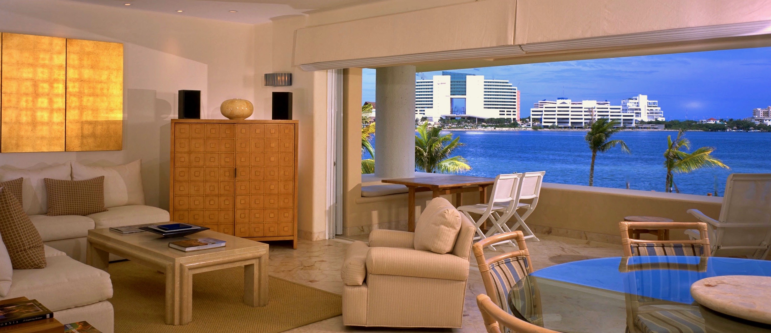 Tropical Style Interiors by Jerry Jacobs Design © Ocaar de la renta furniture and Ocean view.
