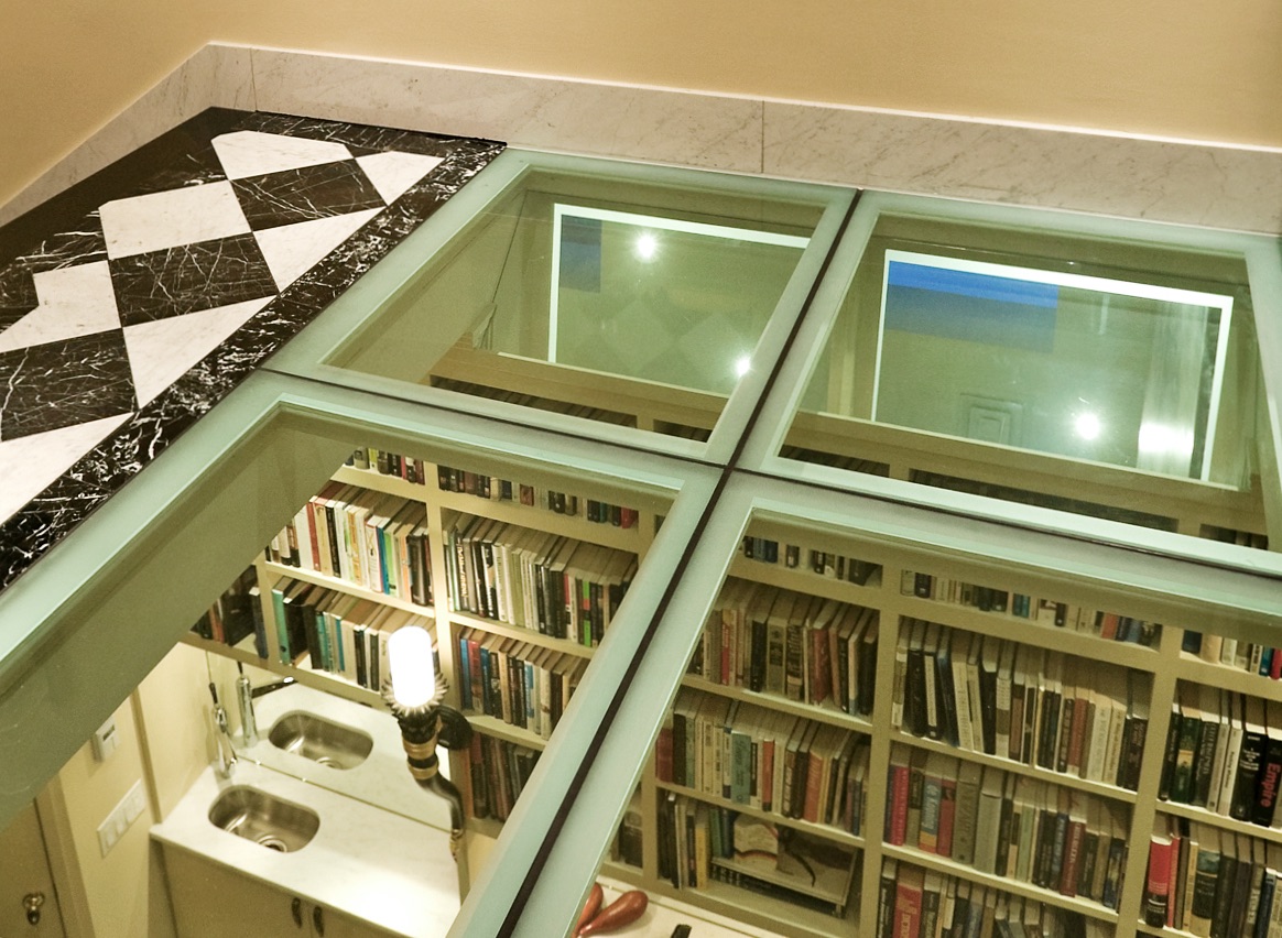Interior Design San Francisco Penthouses. Glass floor in upper landing library below at Buena Vista park Deco, San Francisco by Jerry Jacobs Design©