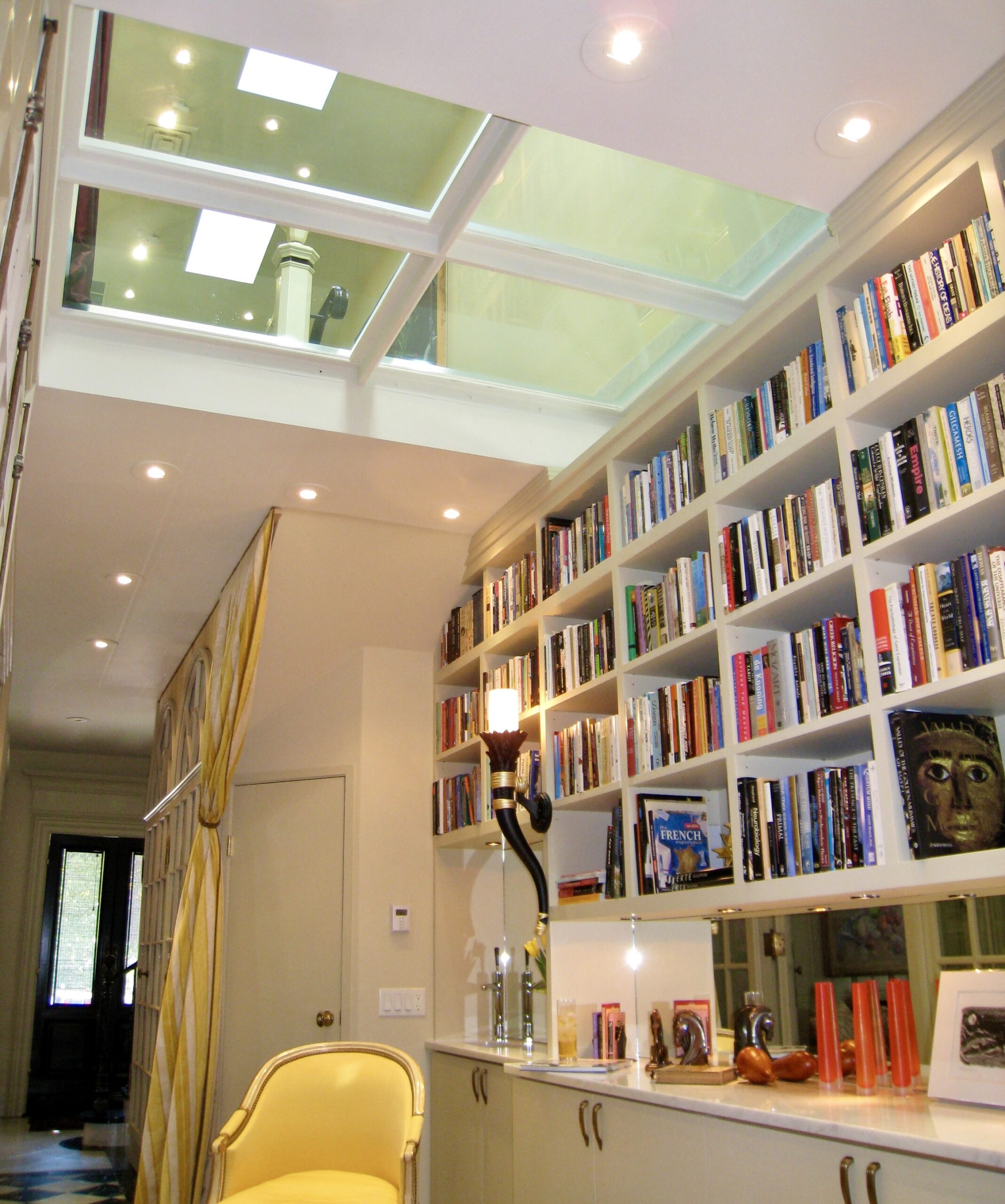 Interior Design San Francisco Penthouses. Glass floor in upper landing from library below at Buena Vista park Deco, San Francisco by Jerry Jacobs Design©