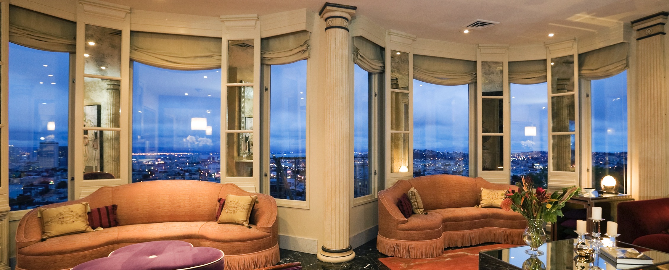 Luxury Interior Designer. Buena Vista Park Deco. Living room with double bay windows with matching curved sofas. Interior Design by Jerry Jacobs Design ©
