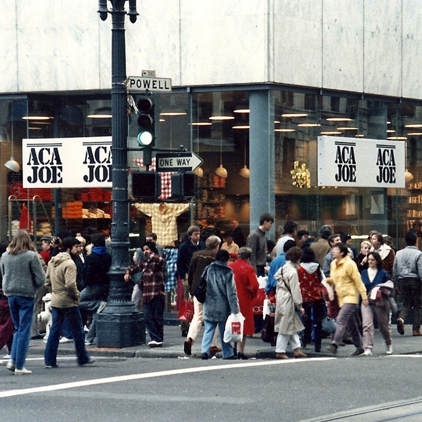 The Square. Union Square San FranciscoAca Joe styore at the corner of Gaeary and Powell, Union Square San Francisco in 1984.The glass elevation was designed to take hurricane windloads and earthquake. The Awning attached tyo the glass were first in the world then too.