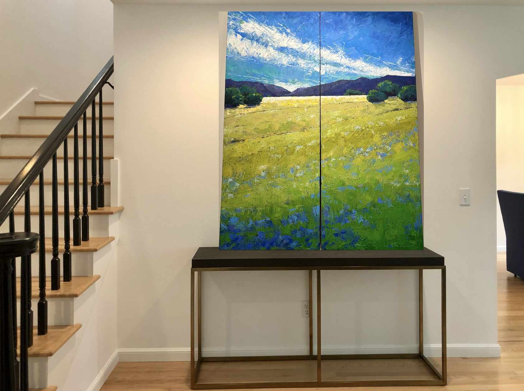Radiant by Alison Haley Paul, from Aerena Galleries. It is a diptych or a 2 piece. easy to carry in the trunk. Full of enery y sunlight in rthe open nature. Sitting rather then hanging on an entry console.