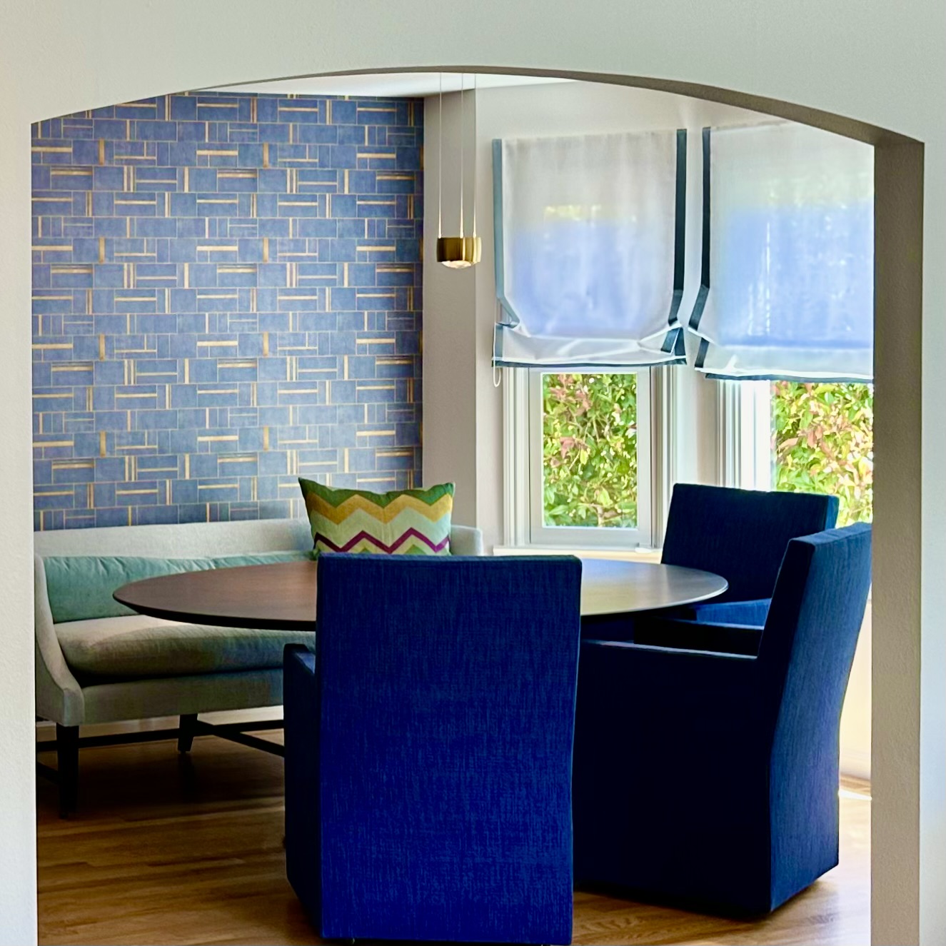 Larkspur home dining room. Wallpaper, sheers with contrasing band.