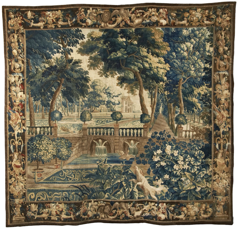 A tapestry with a large garden scene in the center.