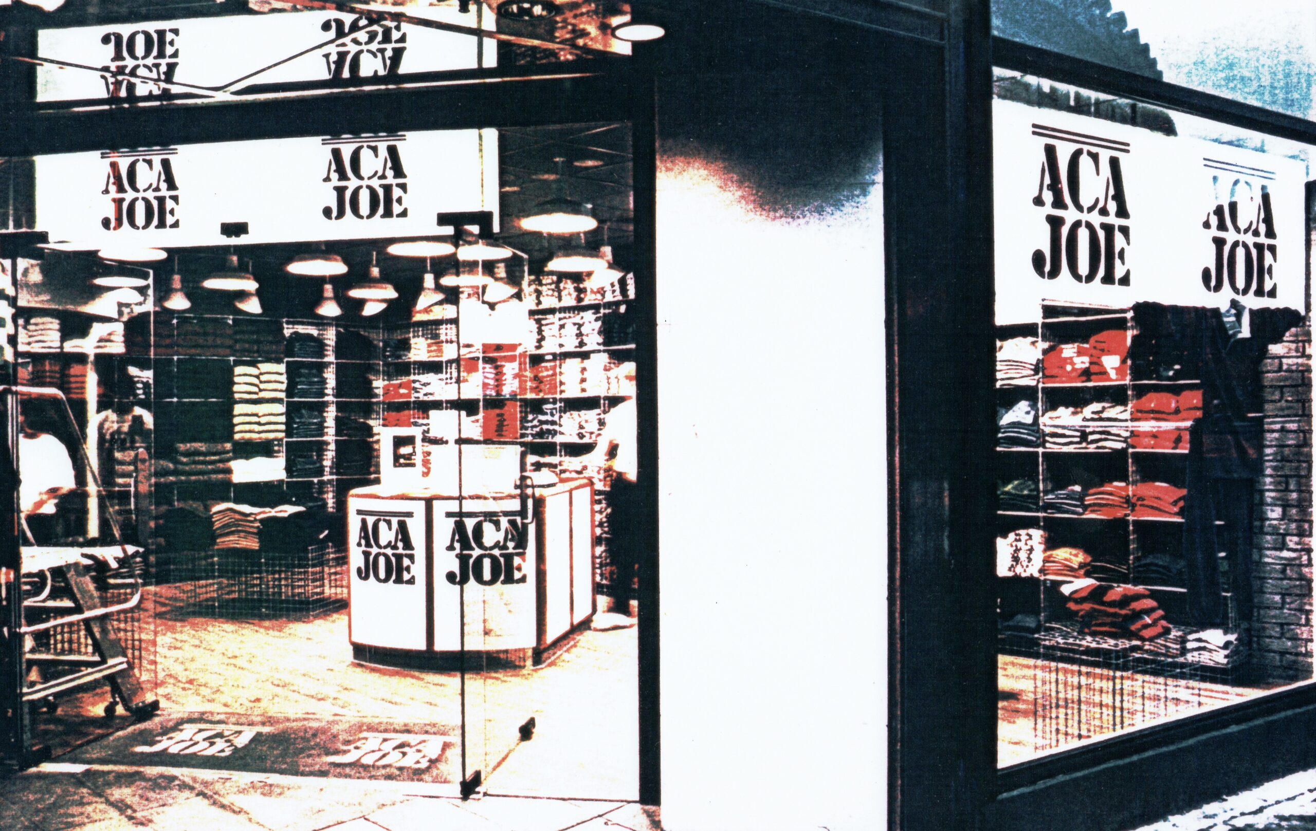 Aca Joe store at Picaddy Circus London 1987. The entrance escalator to the Underground by the side. Tower records next door. Both stores now closed. Luxury Retail, though the price point is low and the line casual.